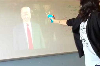 Dallas High School Teacher Posts Video "Shooting" Trump With Squirt Gun In Classroom