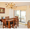 Formal Dining Room w/ Glass Sliders to Lanai