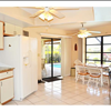 Updated Kitchen-Tray Ceiling, Granite Counters & Glass Sliders to Lanai