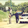 Indianapolis Cop Gives Homeless Man Shoes