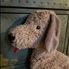handmade dog stuffed animal with embroidered eyes 