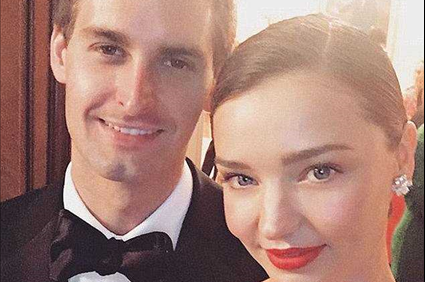 Miranda Kerr reveals she is expecting first child with Evan Spiegel