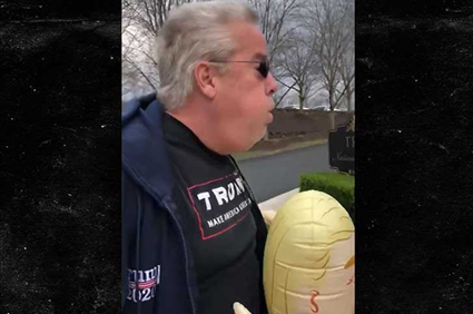 Trump Supporter Charged, Coughed on Protester at Prez's Golf Course