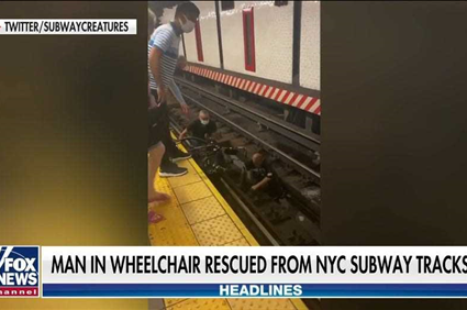 NYC subway rescue: Dramatic video shows Good Samaritan bringing man in wheelchair to safety